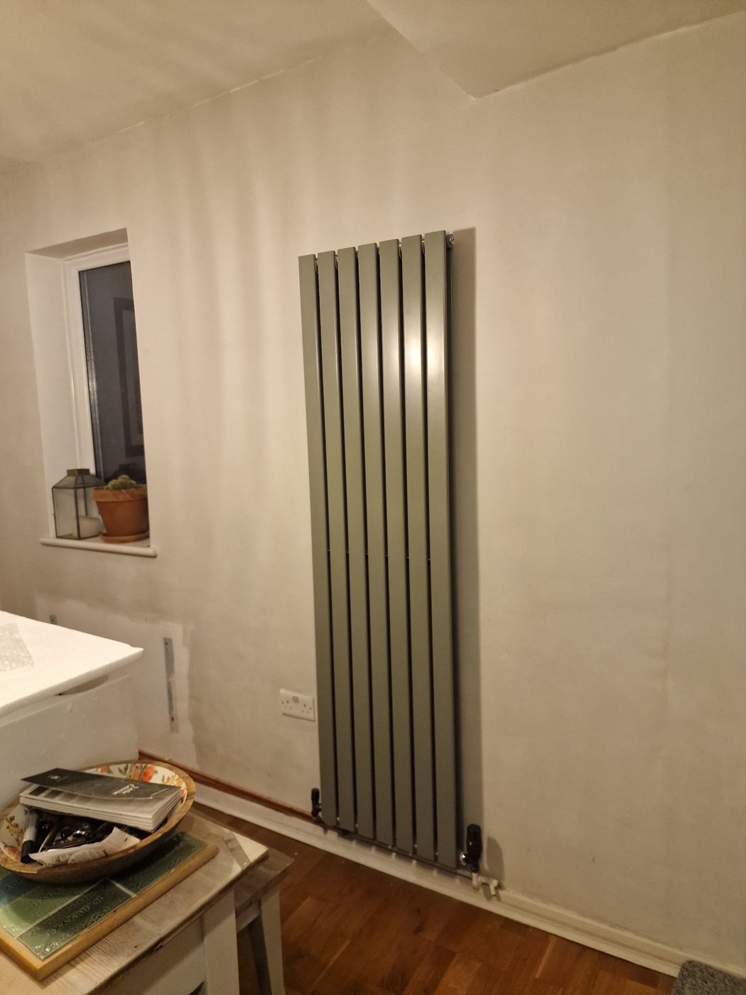 New vertical designer radiator installed in a Kingston home